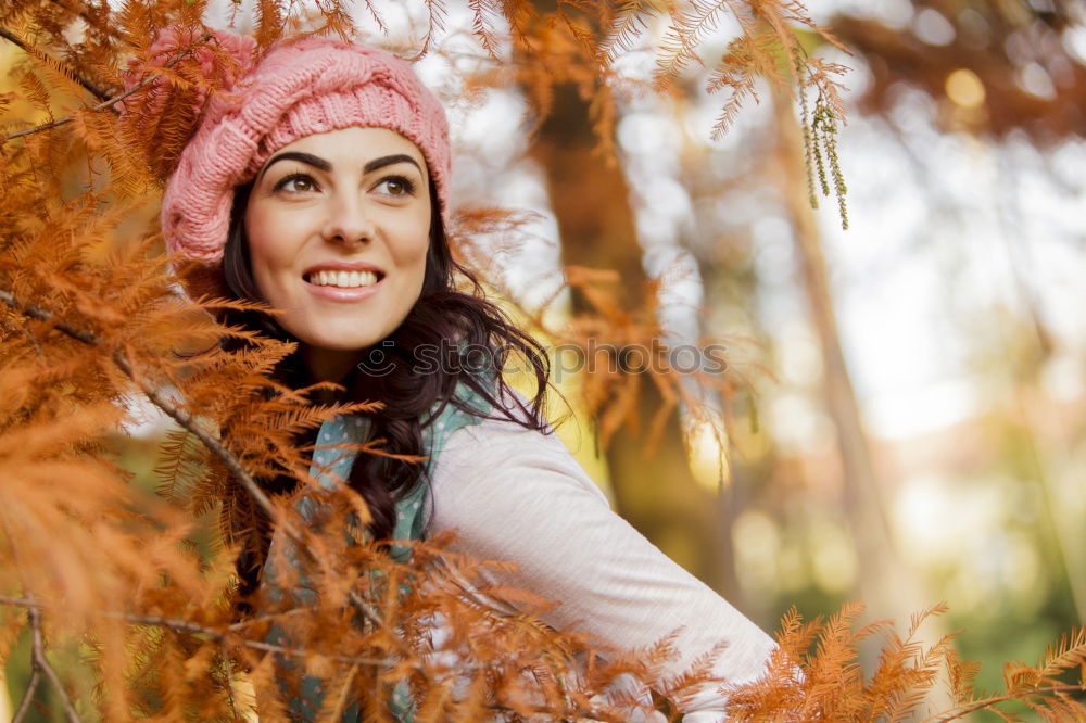 Similar – Matured woman with pink wool hat in the forest