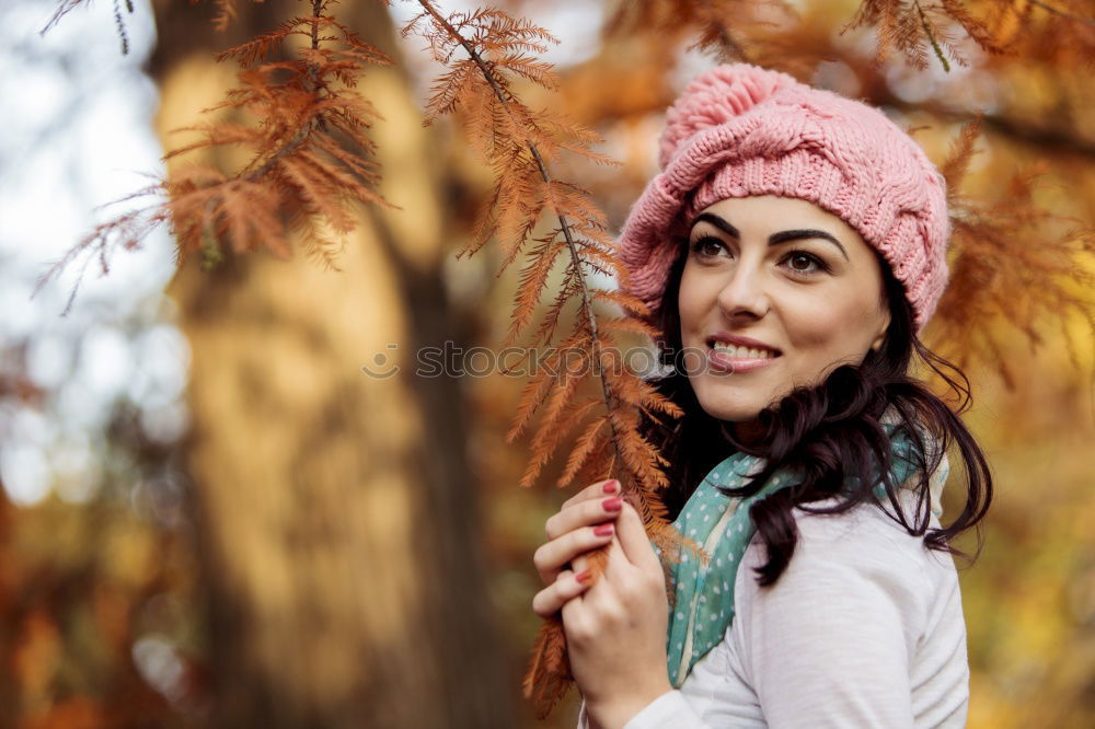 Similar – Matured woman with pink wool hat in the forest