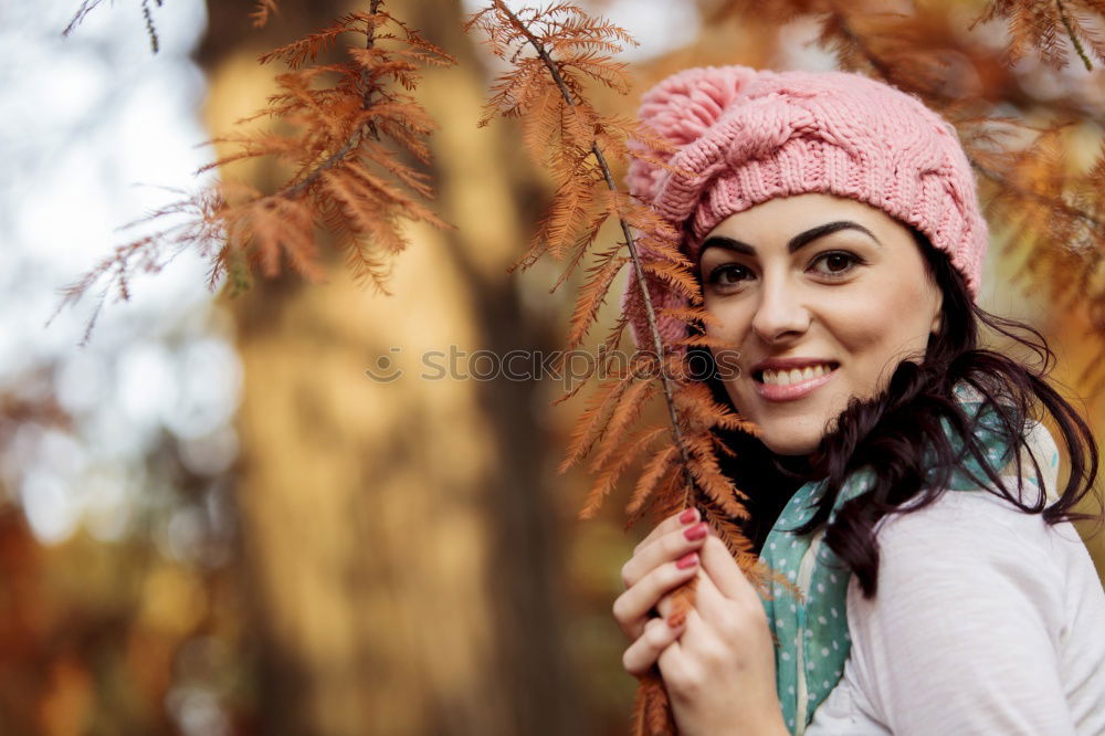 Similar – Matured woman with pink wool hat in the forest