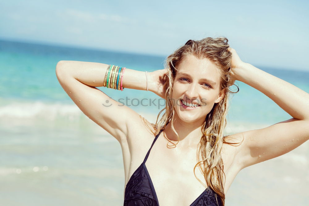 Similar – Image, Stock Photo Attractive trendy woman on a tropical resort beach