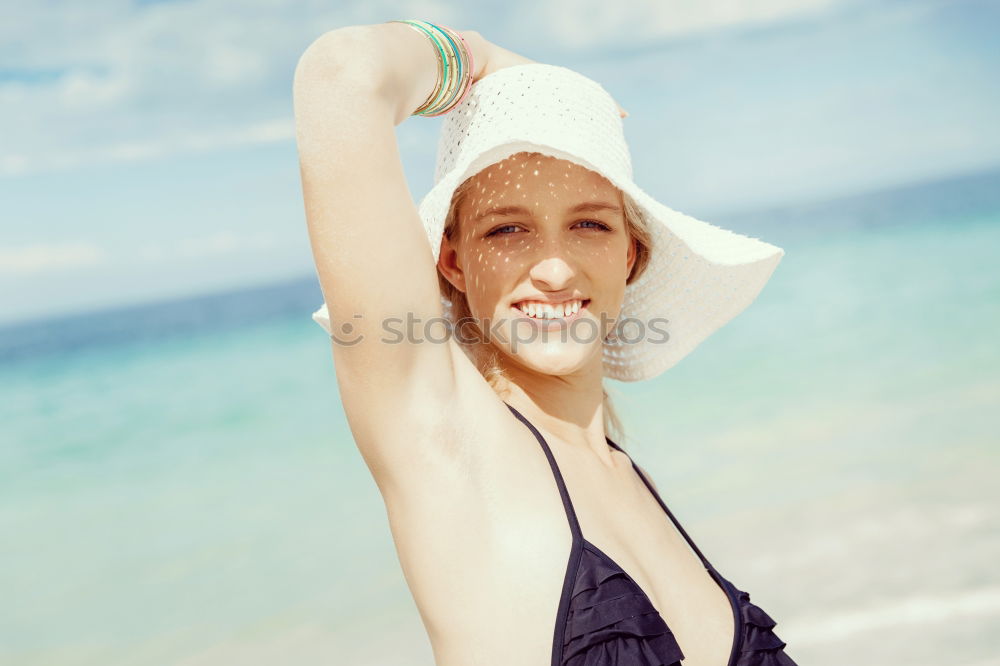 Similar – Image, Stock Photo Attractive trendy woman on a tropical resort beach