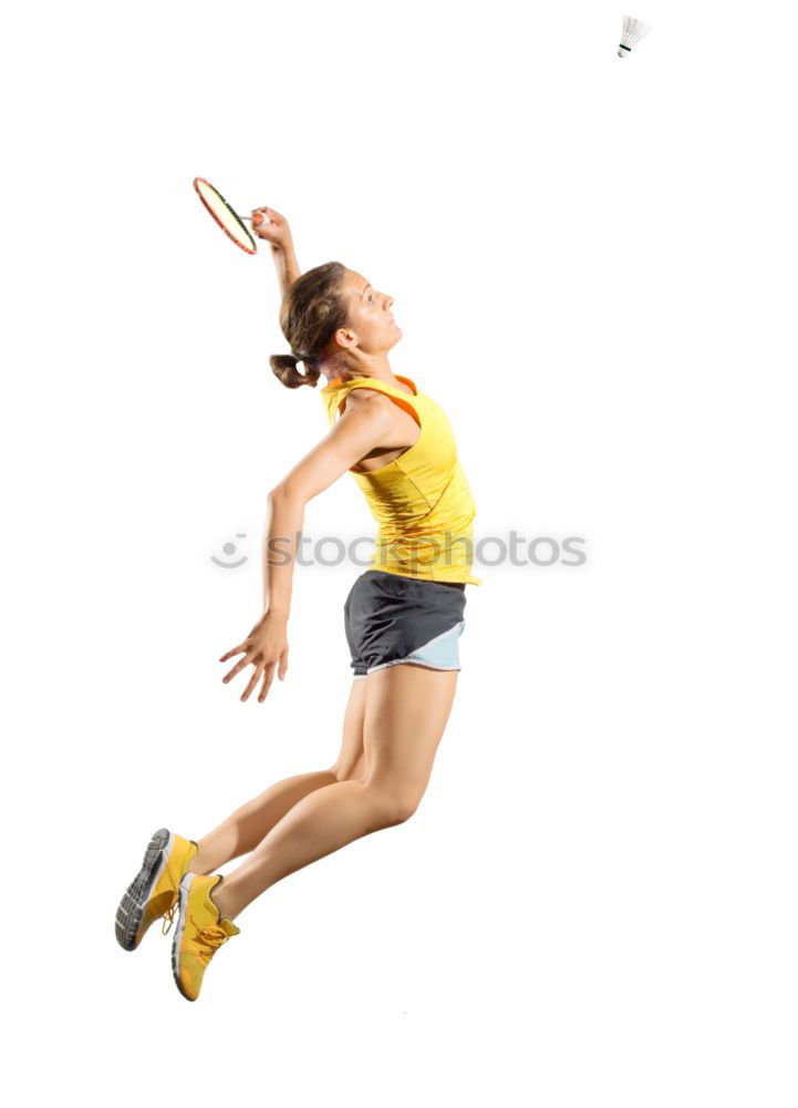 Woman jumping in studio