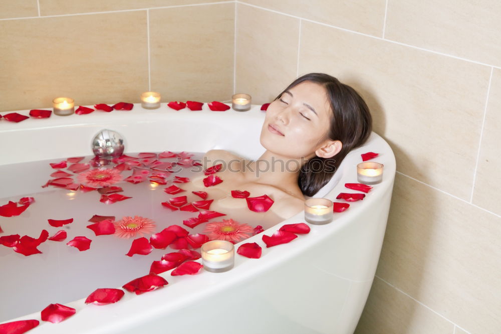 Similar – Woman lying in tub doing hydrotherapy treatment