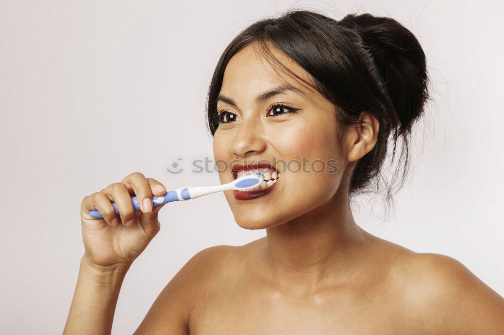 Similar – Image, Stock Photo Young Black Man Brushing Teeth Thoroughly