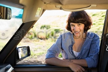 Similar – Image, Stock Photo Arab girl inside an old van parked in a campsite