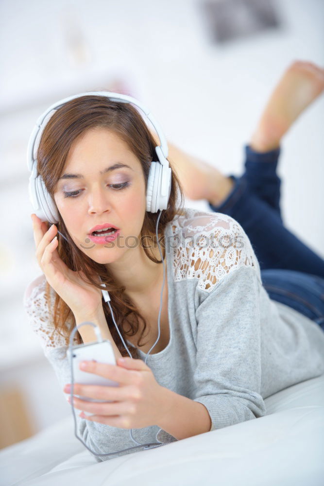 Similar – Image, Stock Photo young woman listening to music with wireless bluetooth headphones and mobile smart phone