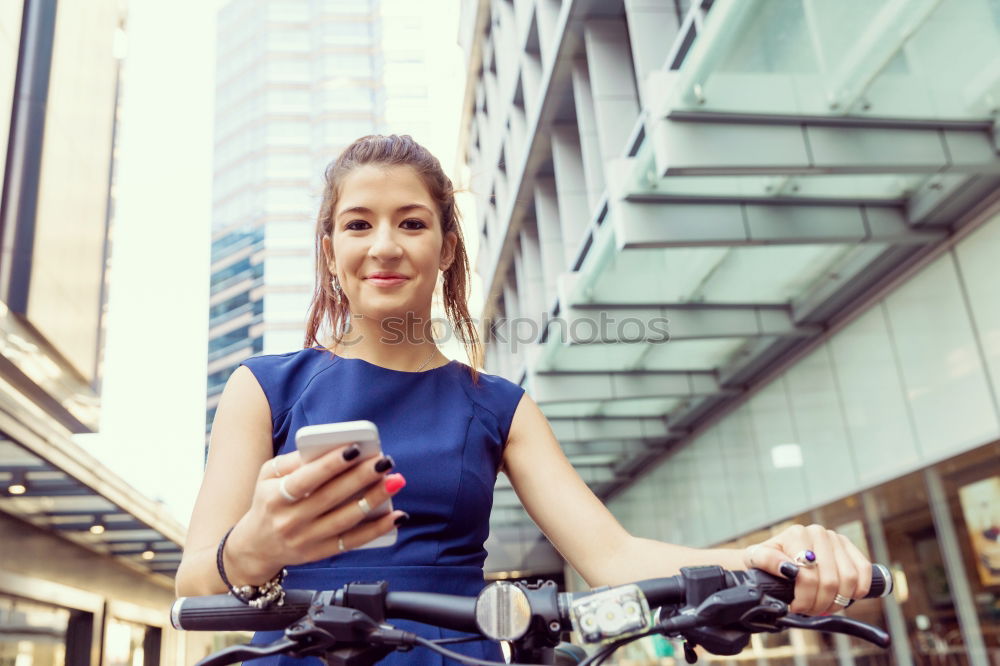 Similar – Image, Stock Photo Women with bikes browsing smartphone