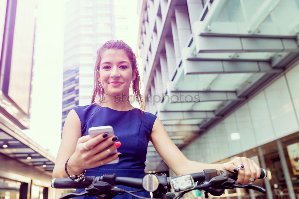 Similar – Image, Stock Photo Women with bikes browsing smartphone