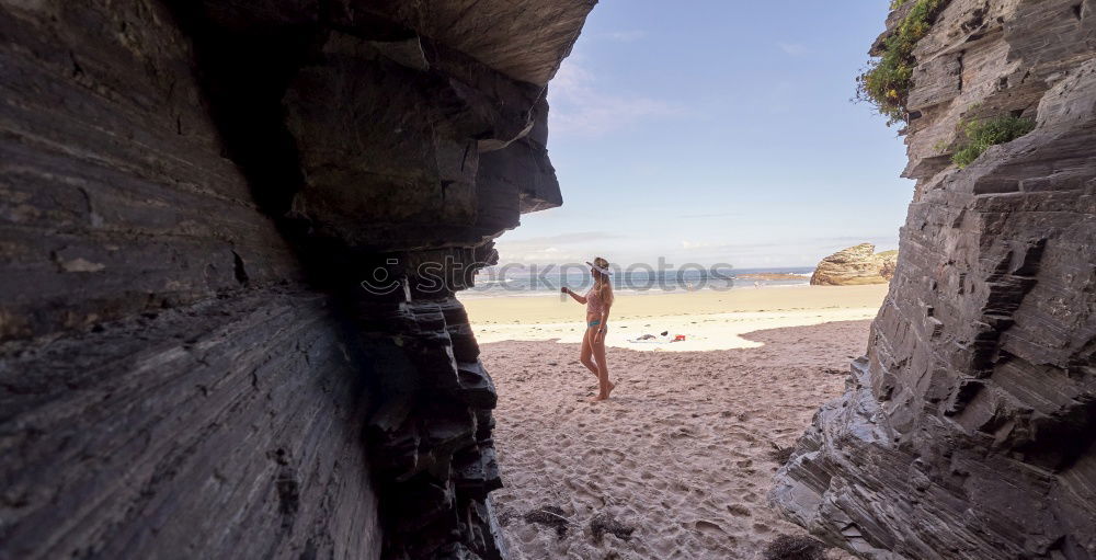 Similar – Woman looking out to sea