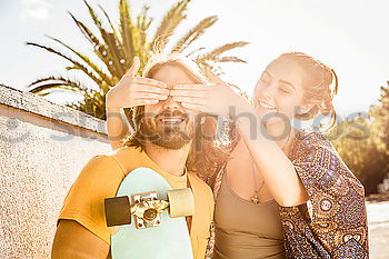 Similar – Image, Stock Photo Interracial couple having fun on the rooftop