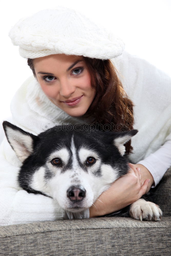 Similar – Young happy woman hugging her dog