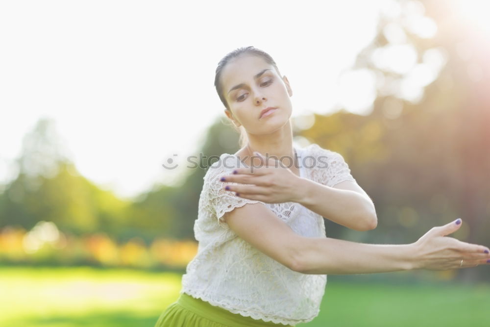 Similar – Image, Stock Photo Mother and daughter doing yoga exercises on grass in the park at the day time