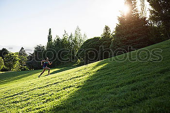 Similar – Image, Stock Photo Two children running down a hill