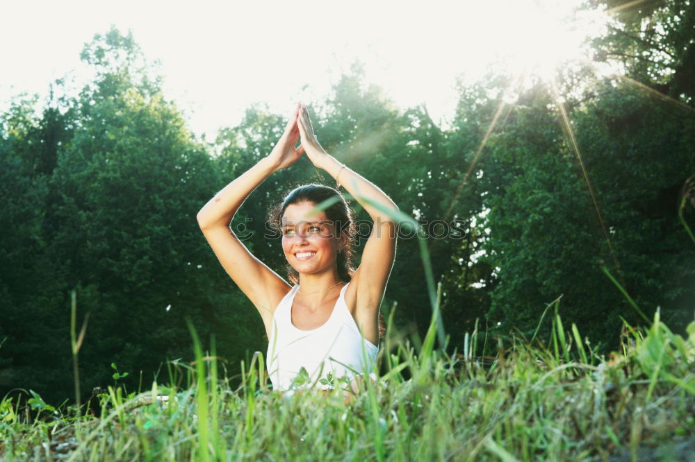 Similar – Image, Stock Photo Young woman doing yoga on wooden road in nature