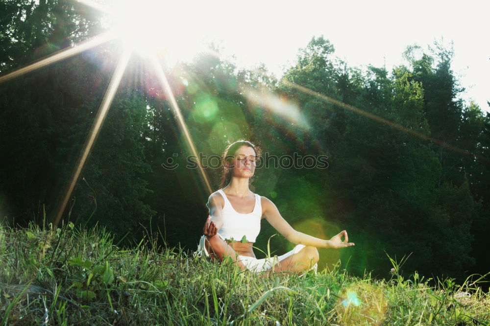 Similar – Image, Stock Photo Young woman doing yoga in nature