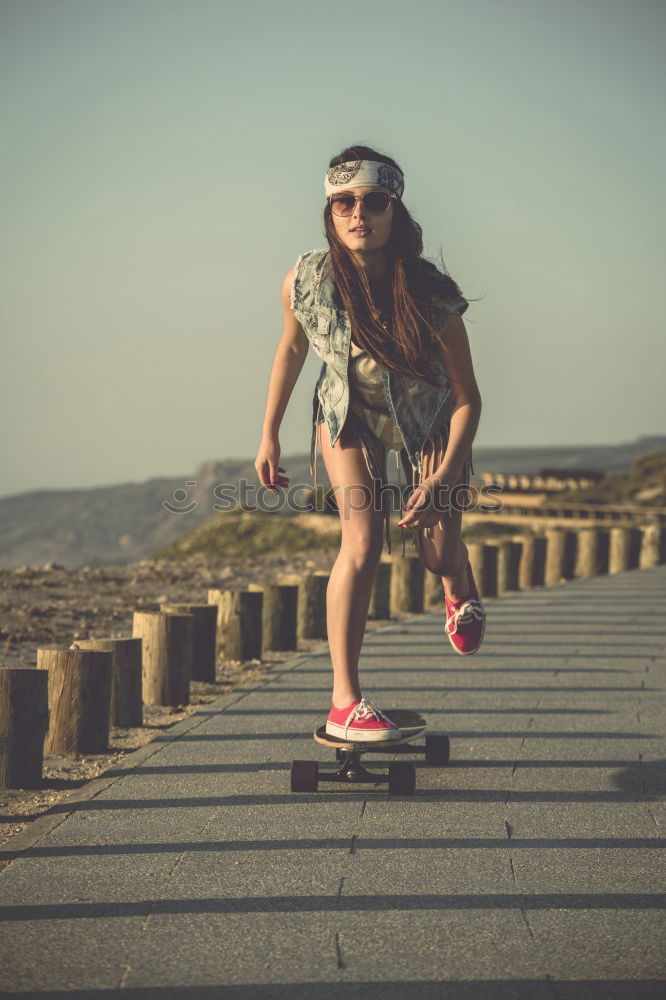 Similar – Image, Stock Photo Beautiful skater woman riding on her longboard.