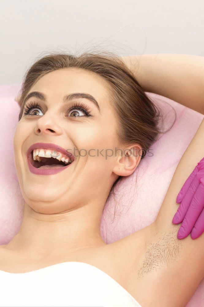 Similar – Image, Stock Photo Young blond woman receiving a head massage in a spa center