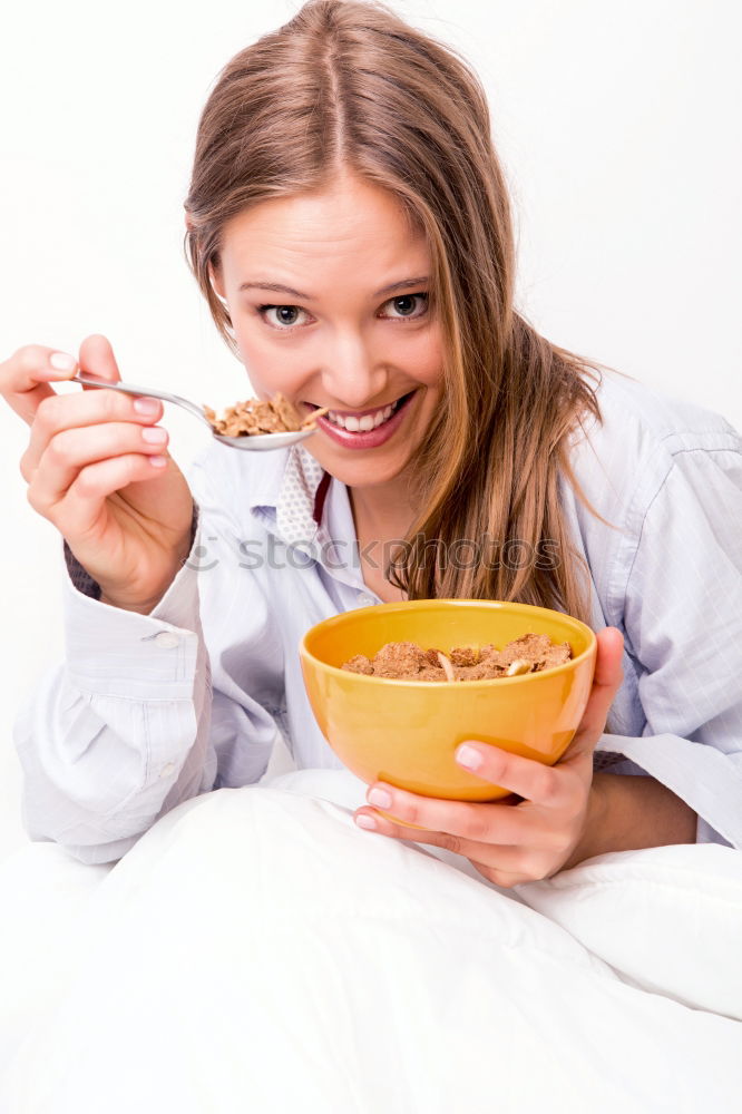 Similar – Image, Stock Photo woman close up eating oat and fruits bowl for breakfast