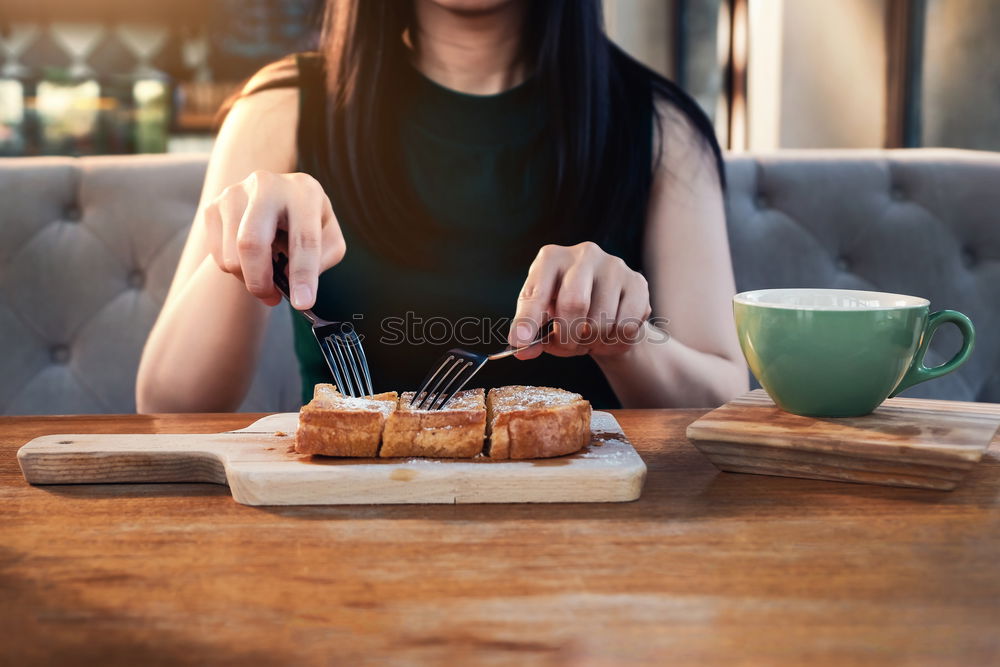 Similar – Crop woman eating sushi