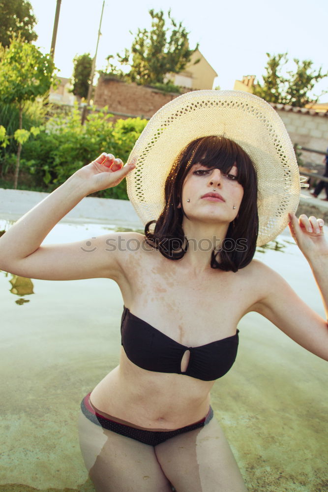 Similar – Image, Stock Photo Young woman enjoying summer in a pool