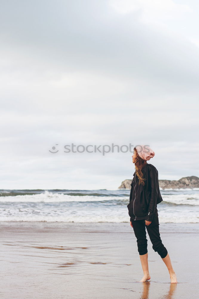 Similar – Image, Stock Photo Woman on stones near sea coast