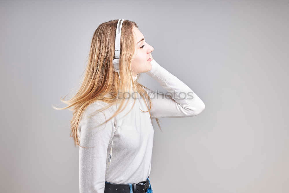 young woman looks up at the text space