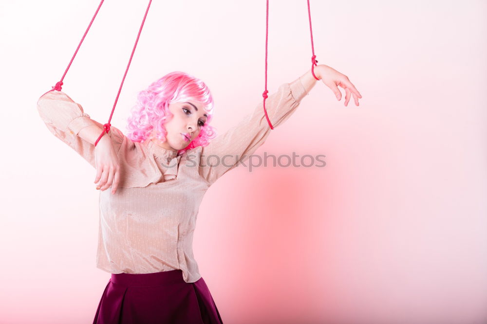 Similar – Image, Stock Photo young, leggy woman with pink hair stands on high heels in front of a white