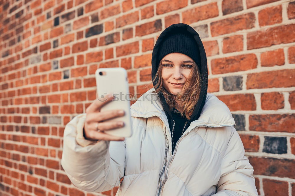 Similar – Image, Stock Photo Happy young woman with her mobile on the street