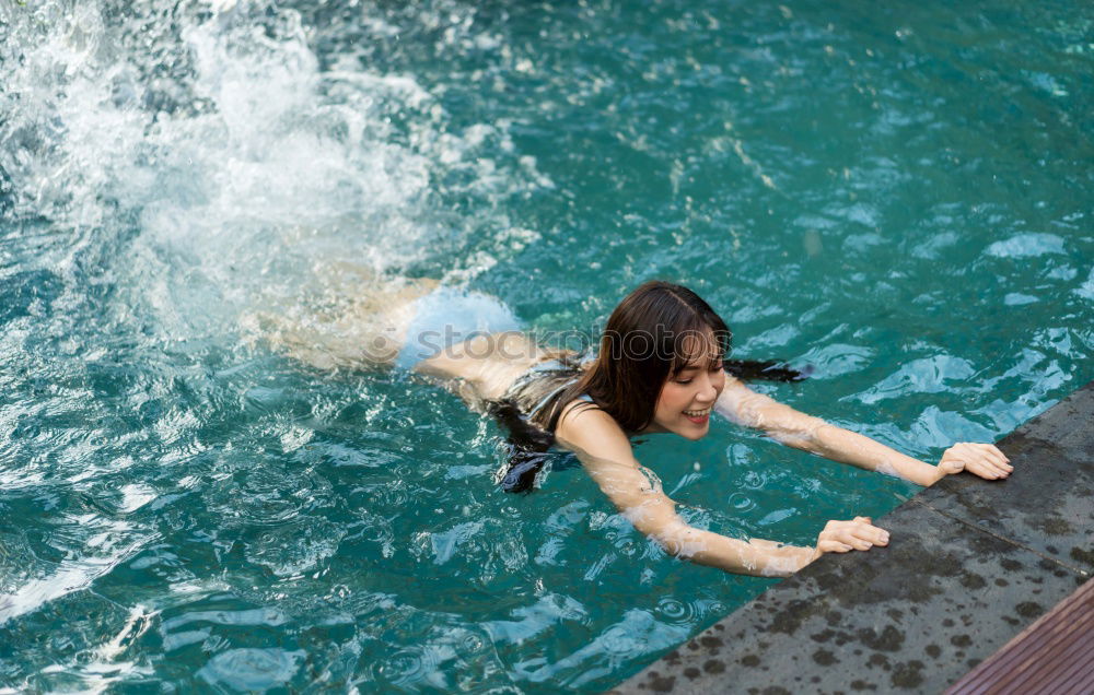 Similar – Stylish girl flying above ground