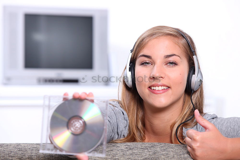 Similar – Image, Stock Photo Young blonde girl using a smartphone while sitting