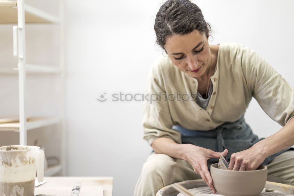 Similar – Image, Stock Photo Beautiful ceramist owner looking to the camera while smiling