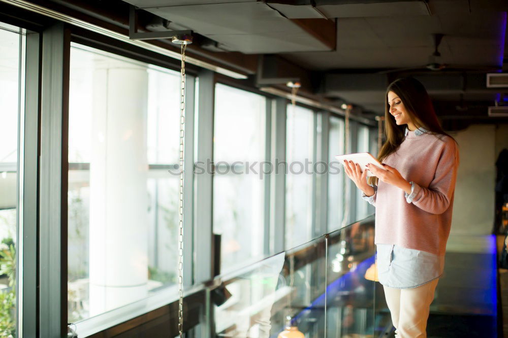 Similar – Image, Stock Photo Woman browsing smartphone in office