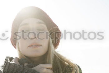 Similar – Woman on the beach in winter