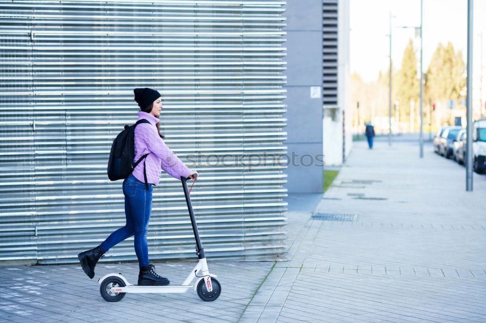 Similar – Foto Bild Frau mittleren Alters auf einem Elektroroller