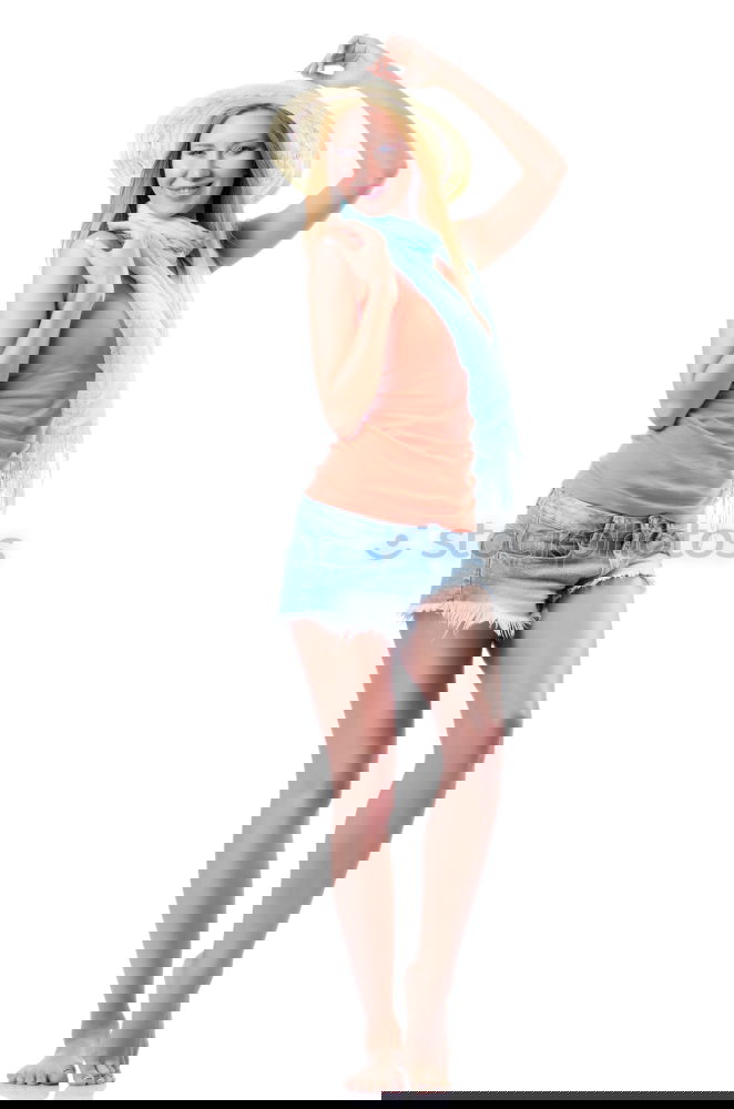 Image, Stock Photo young redhead woman with curls and freckles stands barefoot in hot pants in front of white door and smiles