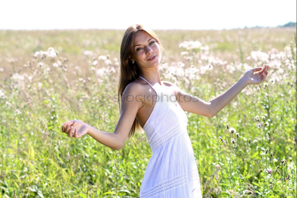 Similar – Image, Stock Photo Smiling girl sitting on the straw