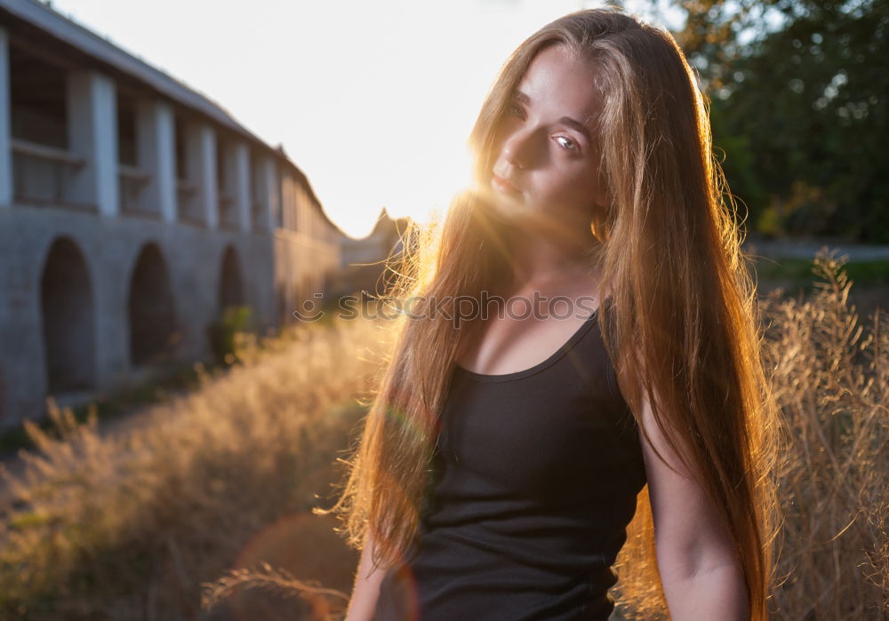 Similar – Close-up of woman in sunlight