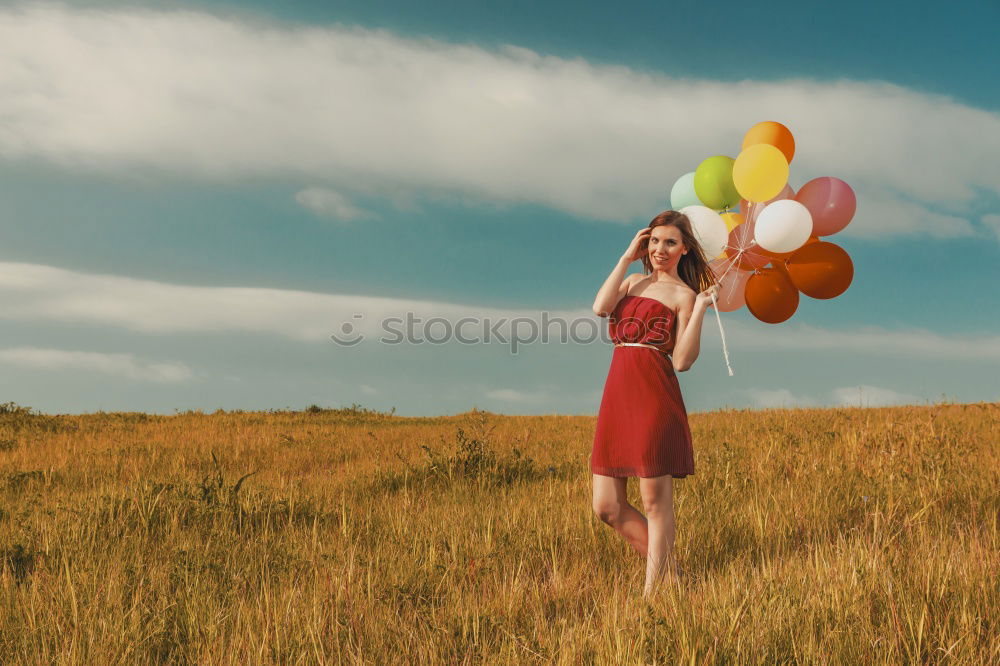 Similar – Woman in middle of wheat field