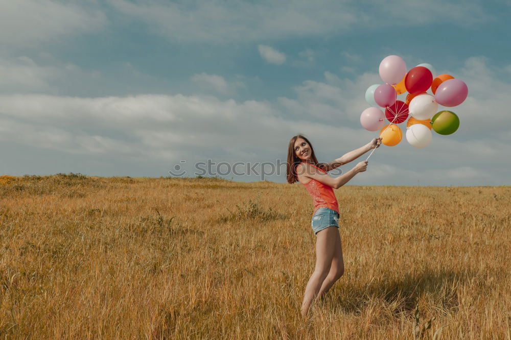 Similar – Girl with balloons