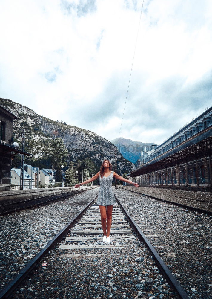 Man running on railroad