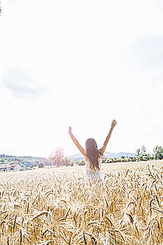 Similar – Woman walking on field