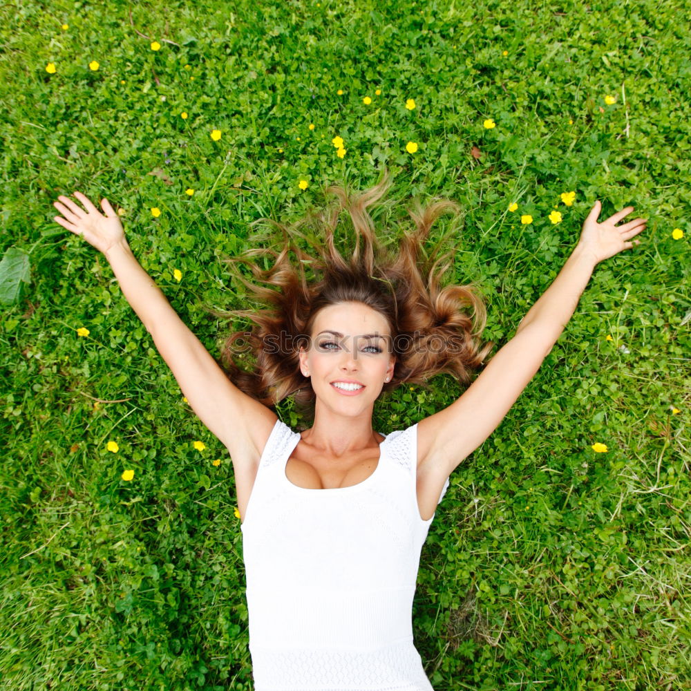 Similar – Image, Stock Photo young cheerful woman lying down on the grass