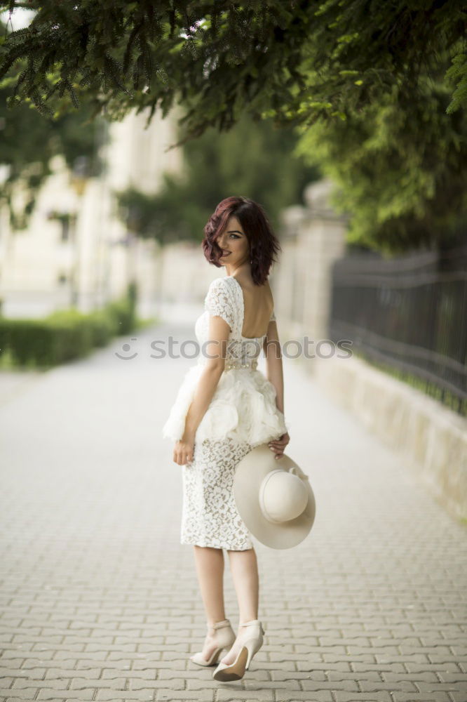 Similar – Barefoot black woman with afro hairstyle sitting on a bench