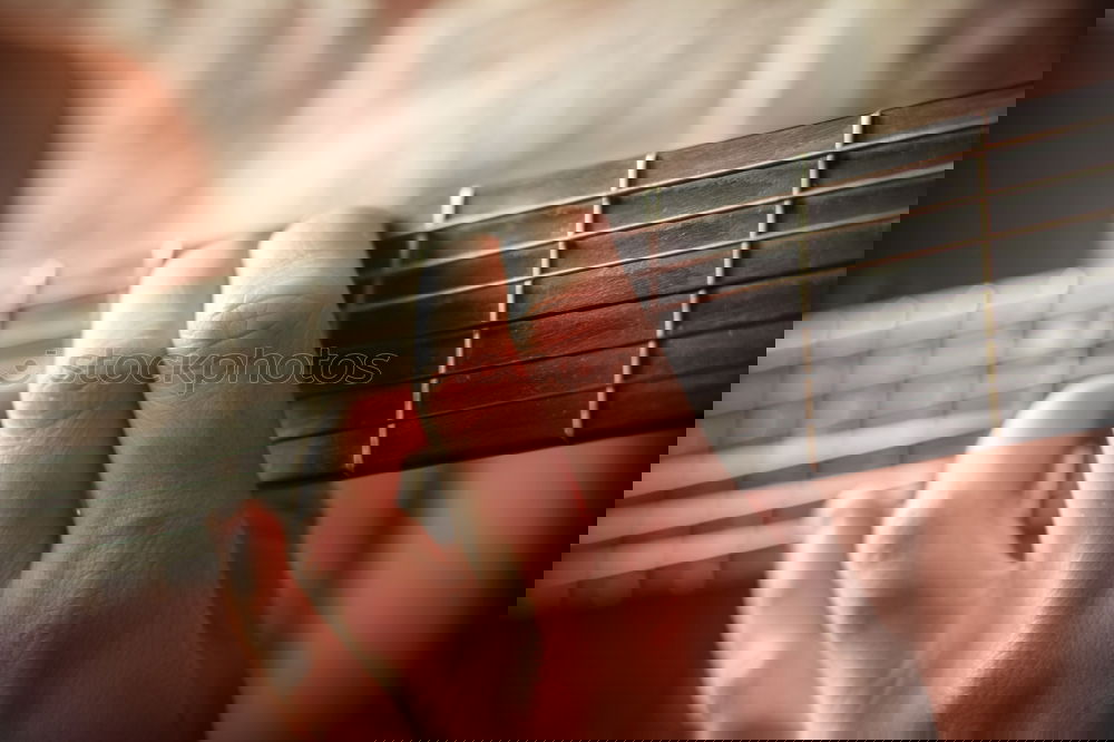 Similar – Foto Bild Eine Frau spielt barfuß Gitarre