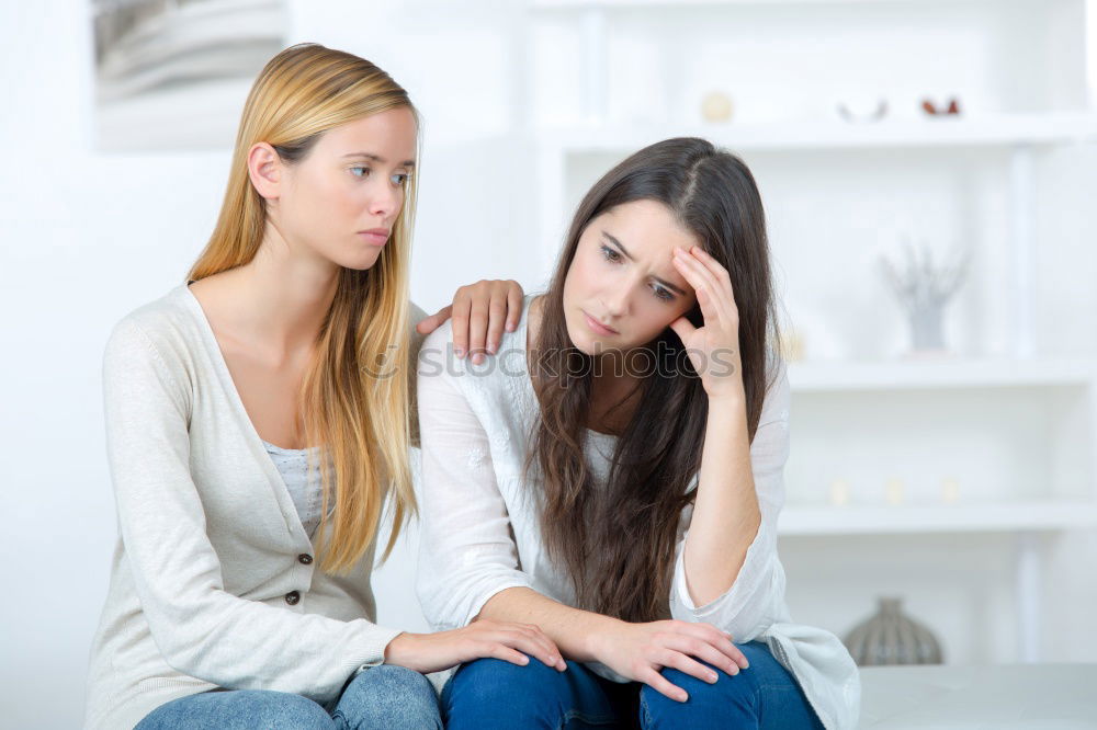 Similar – Image, Stock Photo sad daughter hugging his mother at home. Concept of couple family is in sorrow.