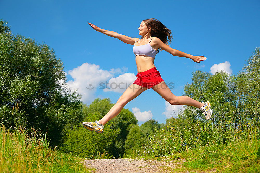 Similar – Woman jogging in countryside