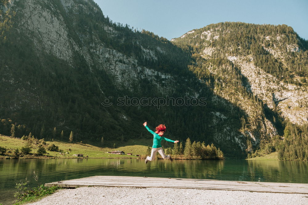 Similar – Image, Stock Photo Handsome tourist at mountain lake