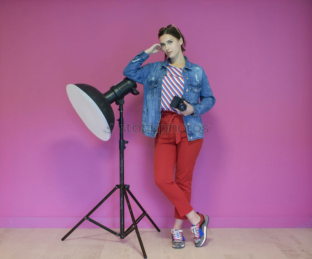 Similar – Woman on stool in studio