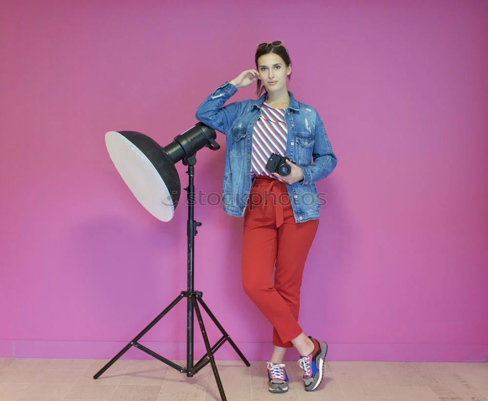 Similar – Woman on stool in studio