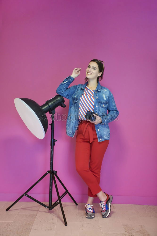 Similar – Woman on stool in studio